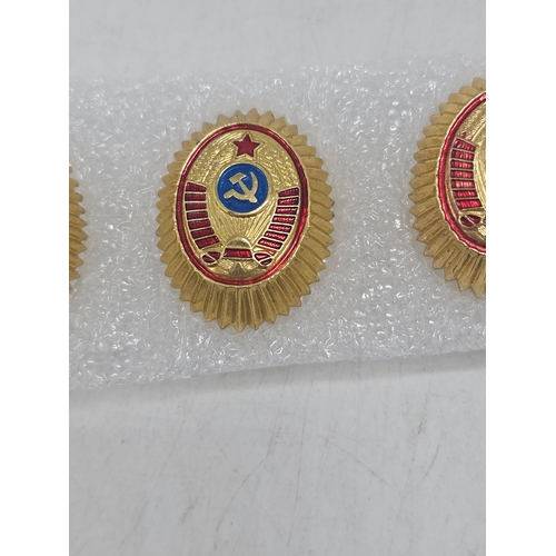 580 - Lot of 9 vintage Soviet Police officer hat badges