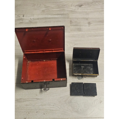 582 - 2 Counter metal boxes with keys, one very heavy