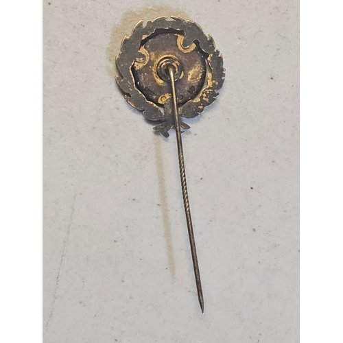 659 - Swedish Merit Badge, it features a blue enamel center with a chain link design and the number 