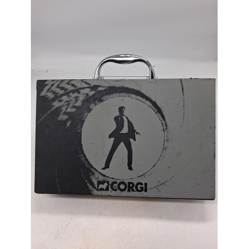 325 - James Bon case by Corgi with 2 classic Bond Cars, playing cards and gambling chips