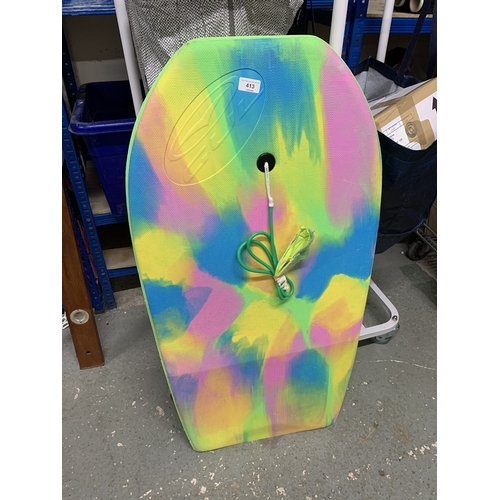 413 - A Multi-Coloured Tie-Dye Style Foam Bodyboard with Coiled Leash