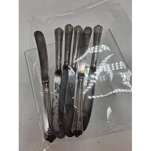 87 - 6 Silver handled butter knives