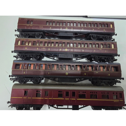 123 - Four N Gauge Model Railway Passenger Coaches including Graham Farish Examples