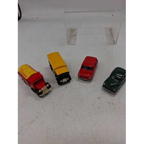 208 - Four Vintage-Style Die-Cast Model Vehicles