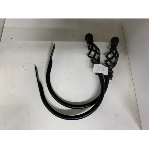 5a - A Pair of Black Finished Metal Curtain Tieback Hooks with Basket Finials