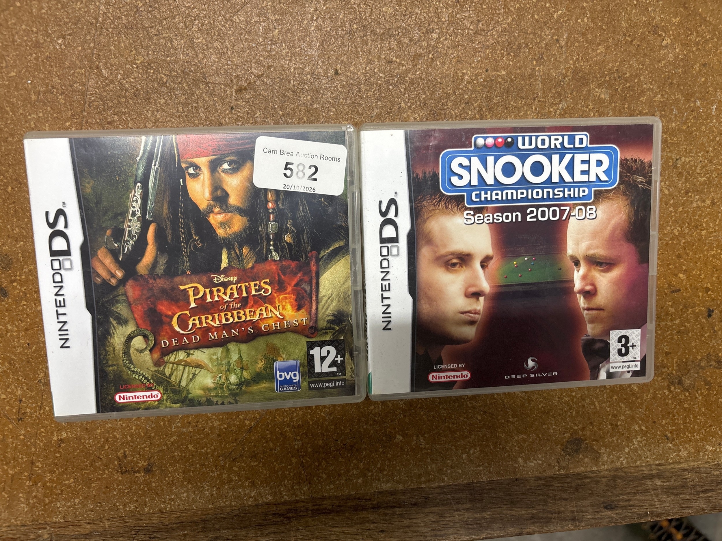 A Pair Of Nintendo DS Handheld Video Games