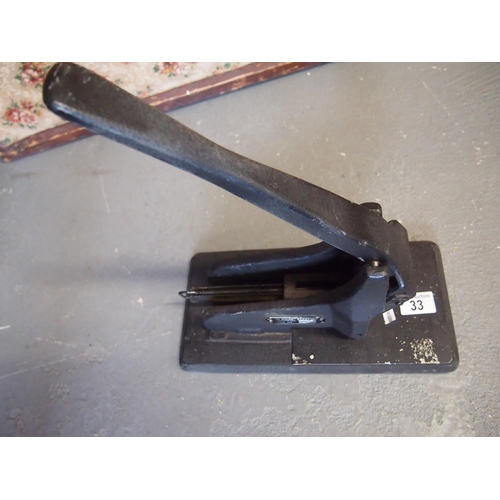 33 - A McGill's heavy-duty cast-iron stapler