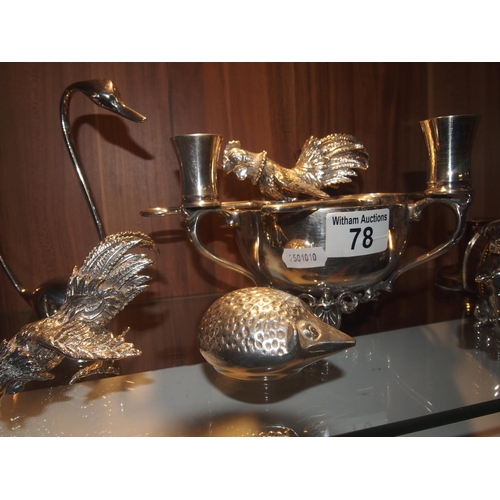 78 - A selection of continental silver plate ware, including napkin rings, paperweights, candle holders, ... 