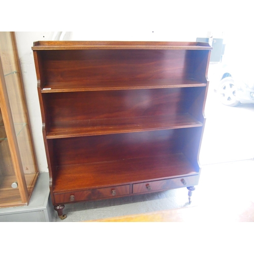 Redman & Hales mahogany three tier waterfall bookcase with drawers and
