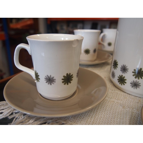 100 - A 1960's 'Allegro' coffee set by J & G Meakin, A/F to one cup