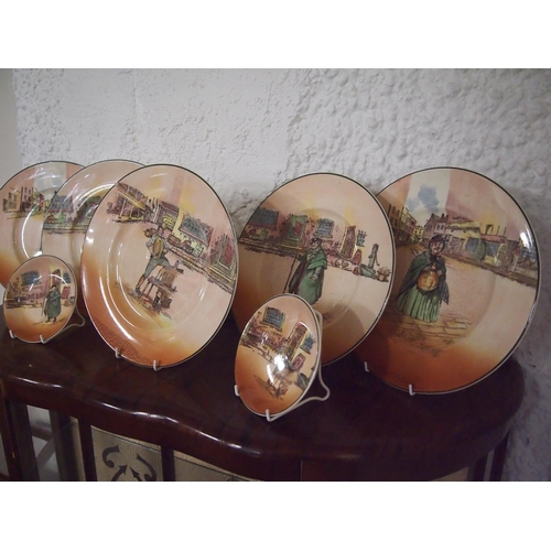 62 - Royal Doulton Dicken's ware items, six dinner plates plus two smaller circular dishes