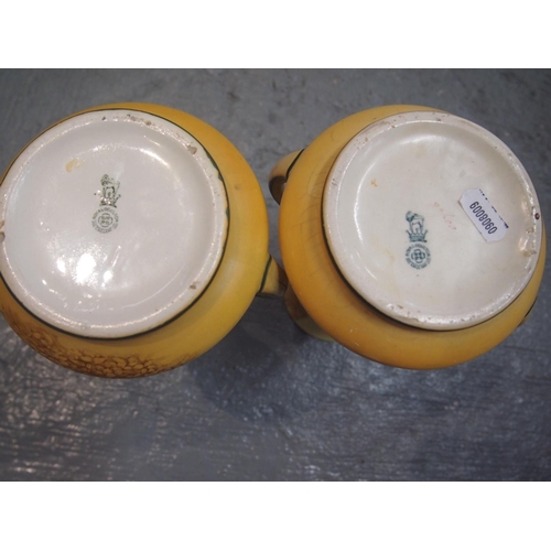 65 - Two antique Royal Doulton Shakespearean series ceramic twin handled tapered flare vases, 'Rosalind' ... 
