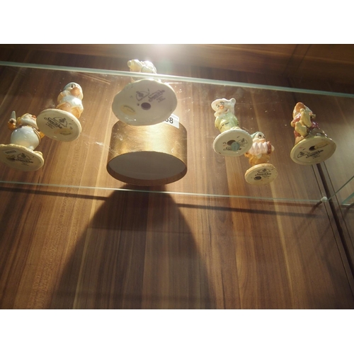 68 - Royal Doulton fine bone china figures of Snow White and the Seven Dwarfs (stamped with makers mark)