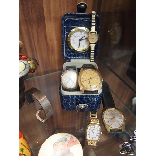 74 - Three vintage gentleman wrist watches plus two lady's wrist watches, various hand carved necklaces a... 