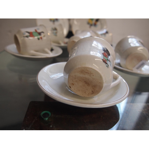 89 - Antique porcelain children's tea set with caricature design of mother and child sporting scenes A/F