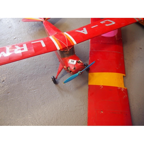 94 - A model aeroplane with a wingspan of approx. 140 cm (which can be hung from ceiling) with spare wing... 
