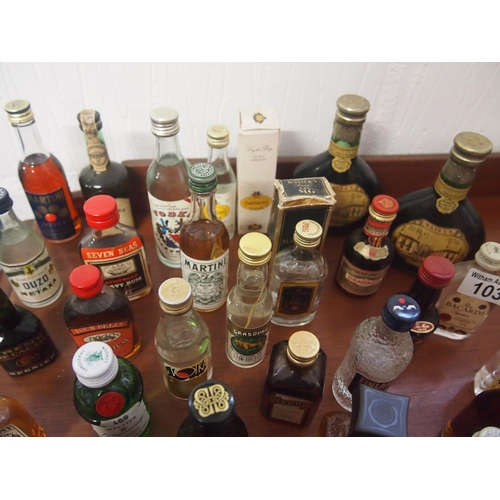 103 - A quantity of miniatures including brandy, vodka, liqueurs etc. (40 in total) A/F