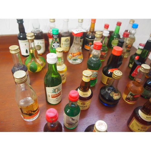 104 - A quantity of miniatures including brandy, vodka, liqueurs etc. (40 bottles in total) A/F