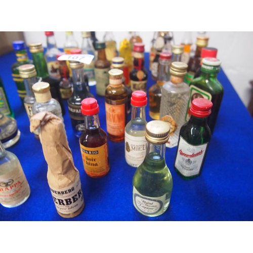 107 - A quantity of miniatures including brandy, vodka, liqueurs etc. (40 bottled in total) A/F