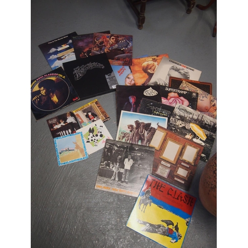 115 - A selection of LP records and 45s including boxed War of the Worlds, Sex Pistols, The Clash, Bowie, ... 