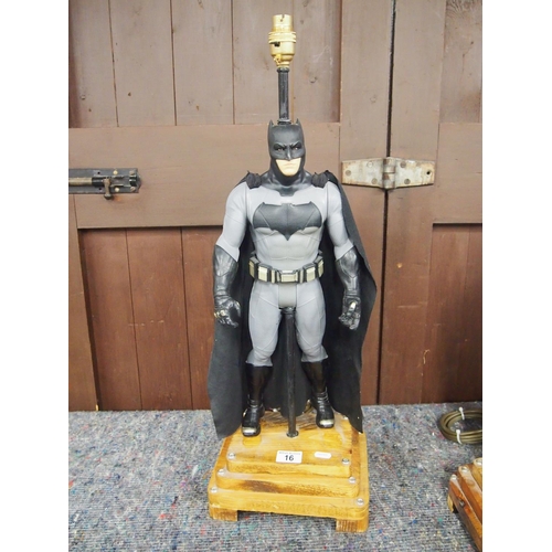 16 - A Batman figurine novelty lamp on tiered wooden base, PAT tested, approx. height 70cm