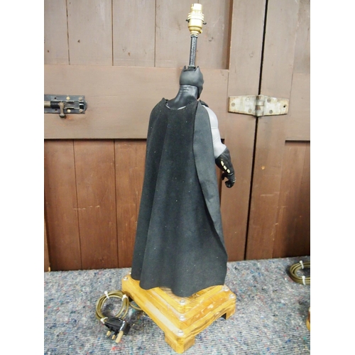 16 - A Batman figurine novelty lamp on tiered wooden base, PAT tested, approx. height 70cm