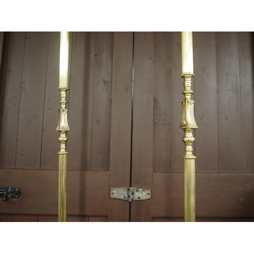 41 - A pair of brass coloured standard lamp stands