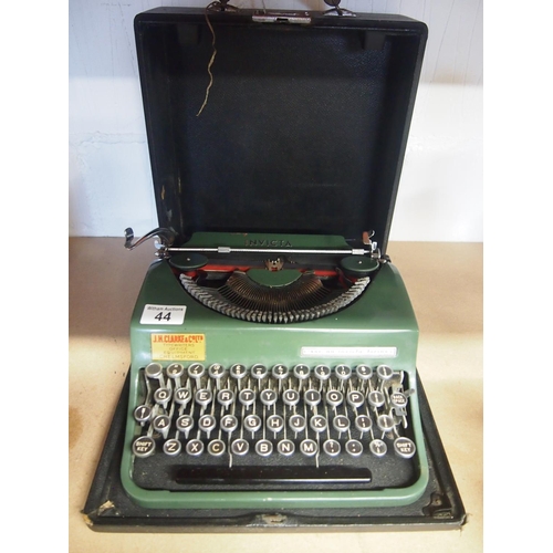 44 - A retro soc.an. Invicta-Torino typewriter in British Racing Green with company stamp J H Clarke & Co... 