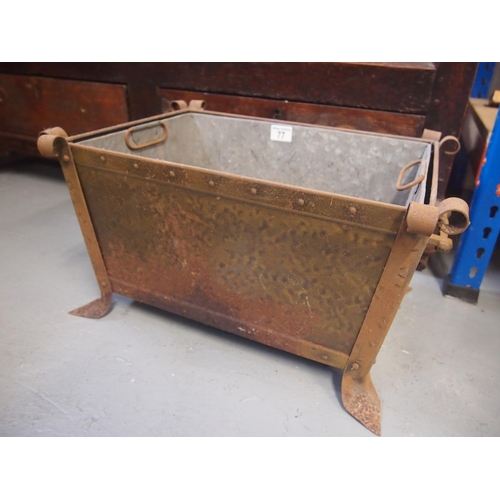 77 - A vintage metal fireside trough with galvanised liner.  The outer design has a hammered effect and h... 