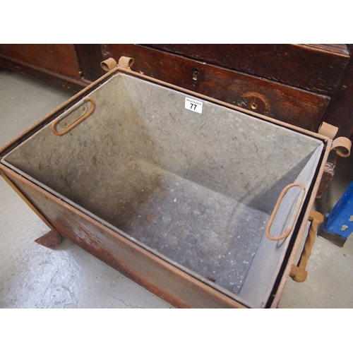 77 - A vintage metal fireside trough with galvanised liner.  The outer design has a hammered effect and h... 