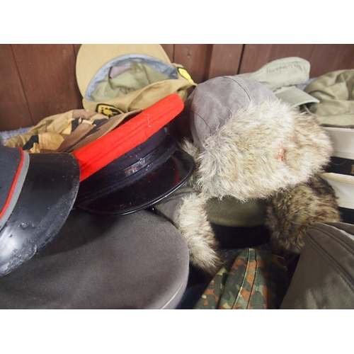 85 - A collection of military style caps, berets and hats, 20 items in total