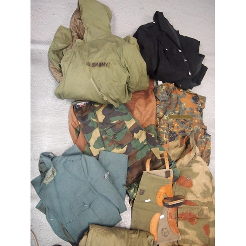 86 - A collection of camouflage military style bags plus other military style clothing etc.