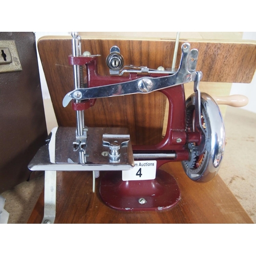 4 - Essex 'Miniature' sewing machine, with instruction leaflet and carrying case