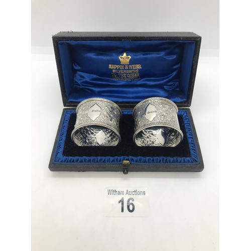 16 - A pair of Victorian solid silver napkin rings with embossed initials. Hallmarked Sheffield 1890-91 (... 