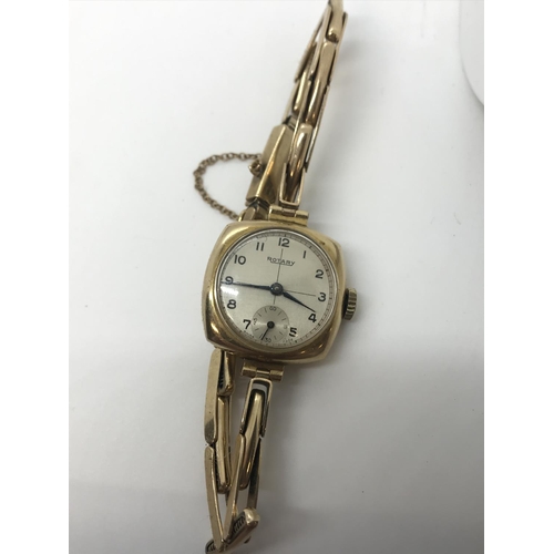 24 - A vintage 9ct yellow gold ladies Rotary wrist watch with white dial and manual wind, 375 is stamped ... 