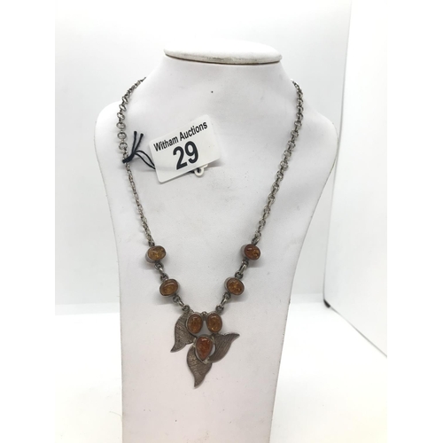 29 - A silver and amber necklace stamped 925, approx. chain length 16