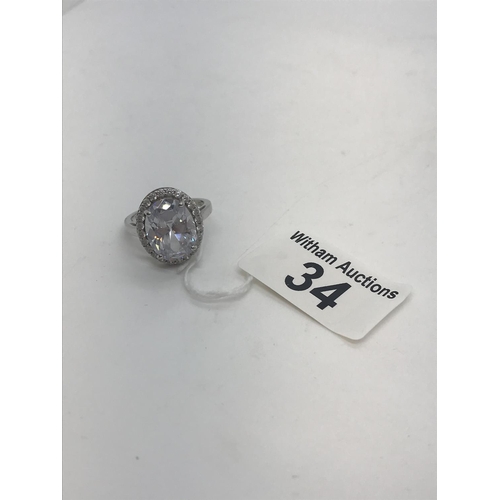 34 - A silver CZ ladies statement piece/dress ring, stamped 925, approx. size T/U