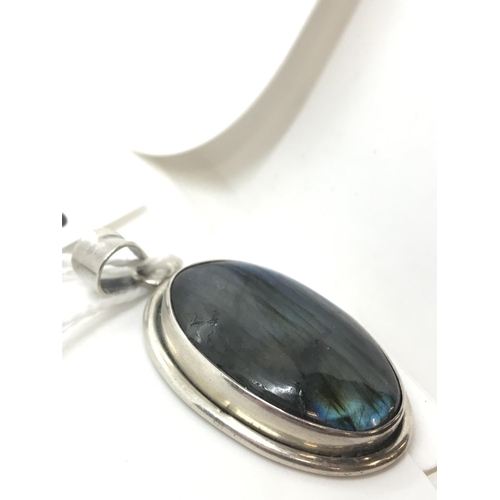 40 - A labradorite silver pendant, unmarked tested as silver, approx. total length 5cm