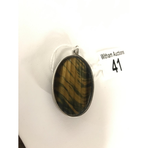 41 - Tigers eye and silver pendant, hallmarked London, approx. length of pendant 5cm