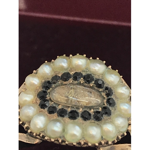 52 - A Georgian yellow gold seed pearl mourning ring with inscription dated 1815 to the underside, approx... 