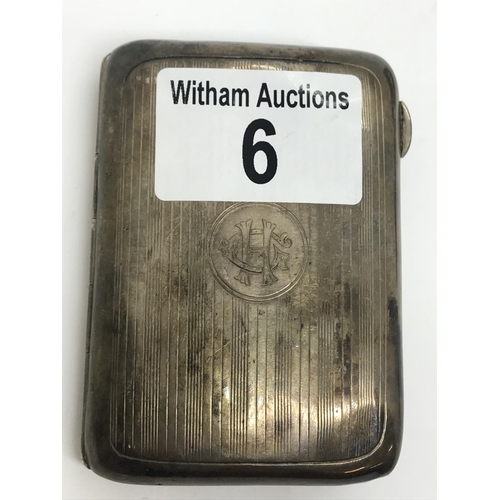 6 - A WW1 silver cigarette case with monogram HG to front, hallmarked Birmingham by William Neale & Son,... 