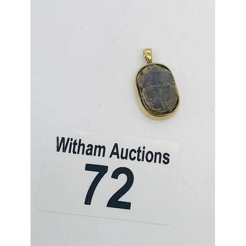 72 - Egyptian scarab beetle set into 22kt gold pendant, stamped 750, approx. overall length 2cm