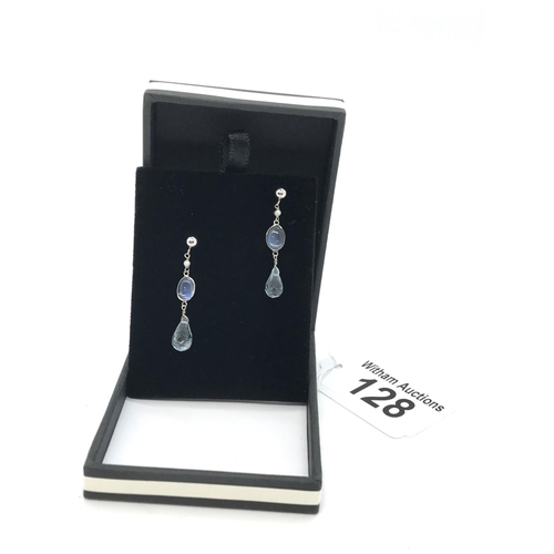 128 - A pair of 14k white gold moonstone and faceted aquamarine drop earrings, stamped 14k