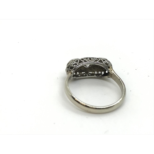 130 - A vintage 18ct white gold three stone diamond ring, approx. .25ct, approx. size J