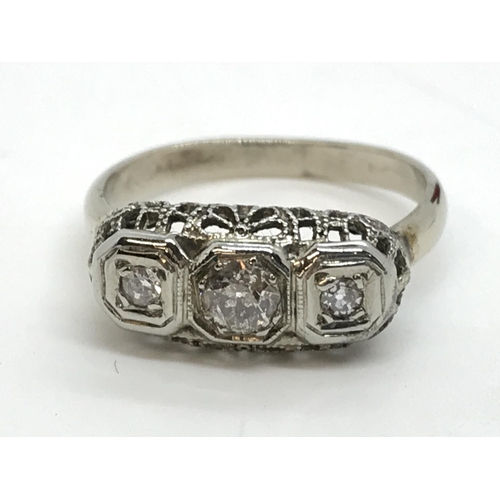 130 - A vintage 18ct white gold three stone diamond ring, approx. .25ct, approx. size J