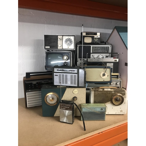 11 - A quantity of vintage portable radio equipment including an Amstrad 6011 multi band marine radio and... 