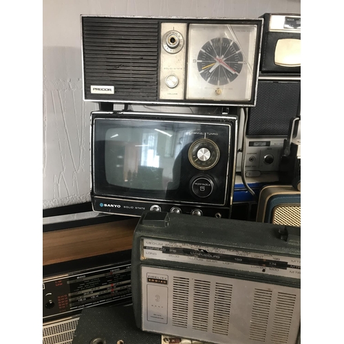 11 - A quantity of vintage portable radio equipment including an Amstrad 6011 multi band marine radio and... 