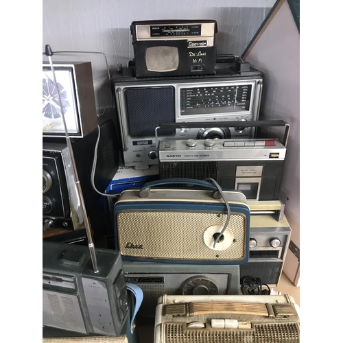 11 - A quantity of vintage portable radio equipment including an Amstrad 6011 multi band marine radio and... 