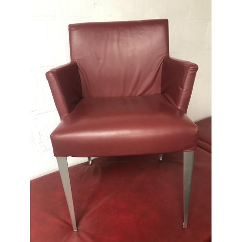 88 - A pair of B&B Italia Maxalto designer red leather chairs and aluminium style legs