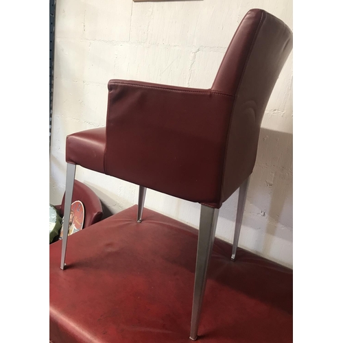 88 - A pair of B&B Italia Maxalto designer red leather chairs and aluminium style legs